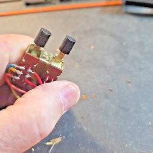 An EJECT button from a KRACO CB Radio, no nomenclature