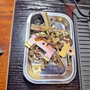 complete set of screws and brackets from a nice midland 863b base station radio
